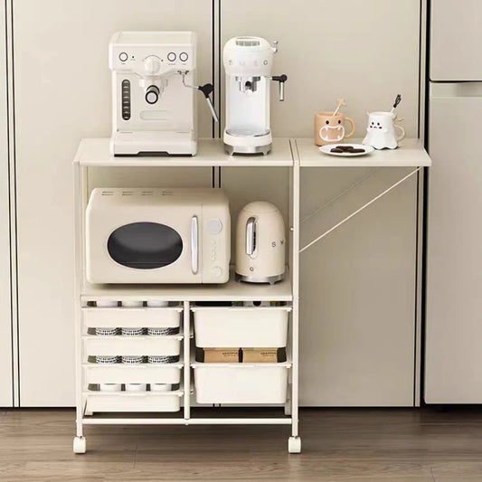 Kitchen appliance cart with various kitchen items on a wooden floor.