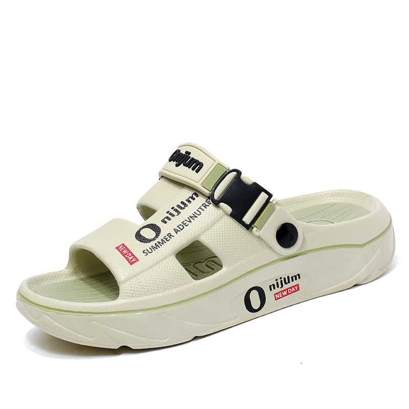 Beige sandal with black strap on a white background