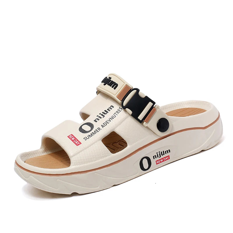 Beige sandal with branding on a white background