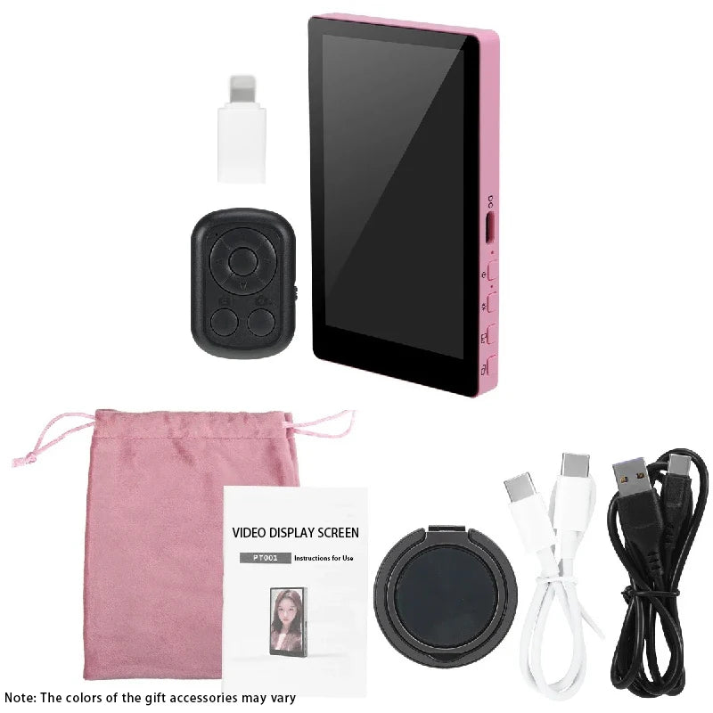 Set of electronic accessories including a screen, remote control, and cables on a white background.
